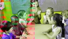 teacher doing an activity with her students